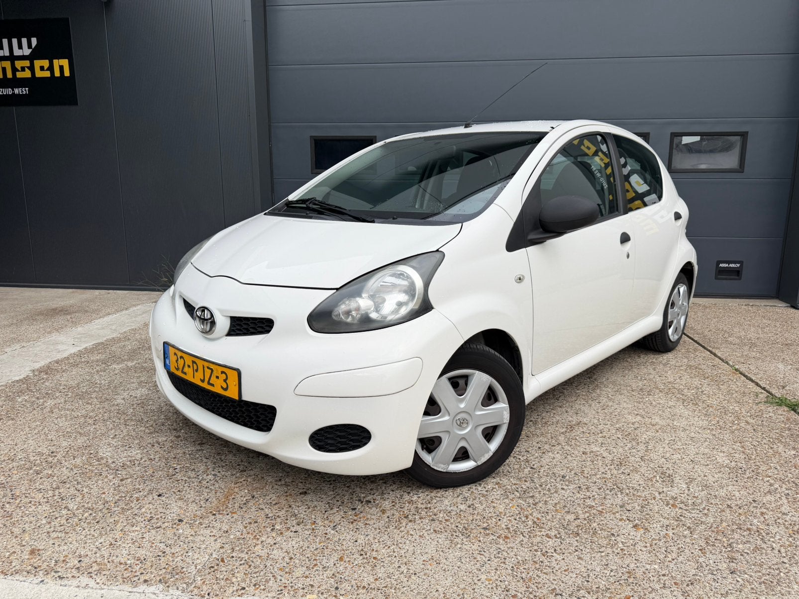 Toyota Aygo 1.0 12V Vvt-i 5DRS 2011 Wit Airco Apk Nap Navi, Auto's, Toyota, Voorwielaandrijving, Stof, Zwart, 4 stoelen