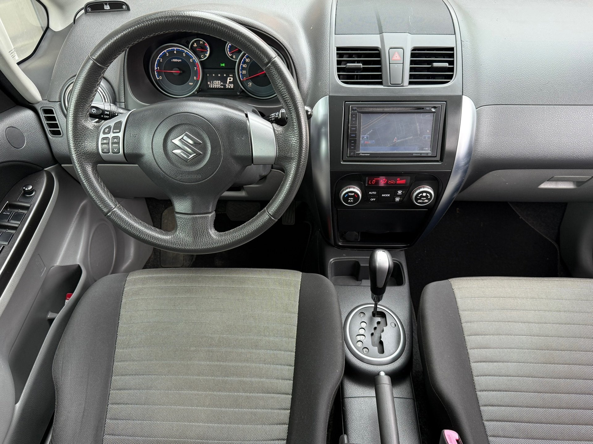 Suzuki SX4 1.6 Exclusive AUTOMAAT | CLIMATE | NAVI | KEYLESS, Euro 5, Stof, Gebruikt, Zwart