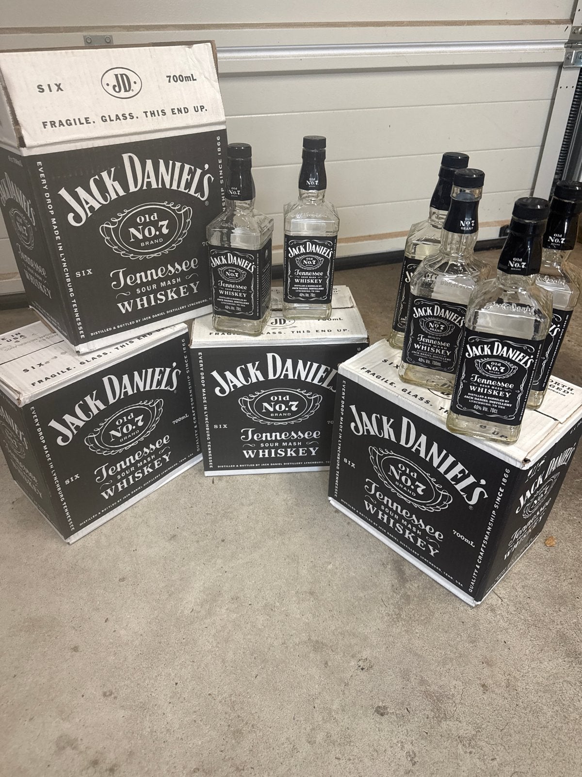 24 lege Jack Daniel's flessen 0,7L met 4 dozen, Ophalen of Verzenden, Gebruikt