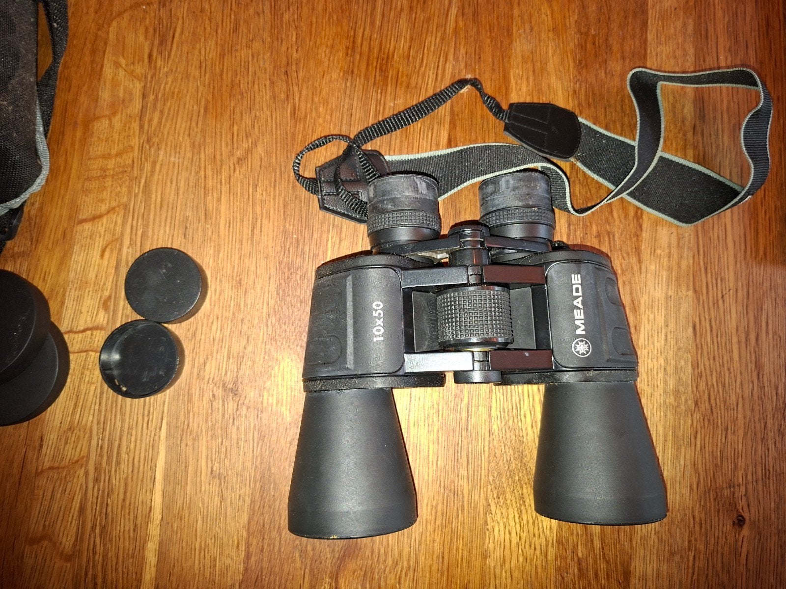 Meade 10x50 verrekijker met tas en lensdoppen, Audio, Tv en Foto, Gebruikt, Dakkant (recht), Ophalen of Verzenden, 8 tot 12x