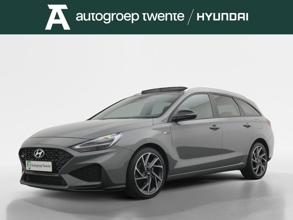 Hyundai i30 Wagon 1.5 T-GDi MHEV NLine | All Seasons | Panor, Auto's, 12 maanden, Stof, Gebruikt, Zwart