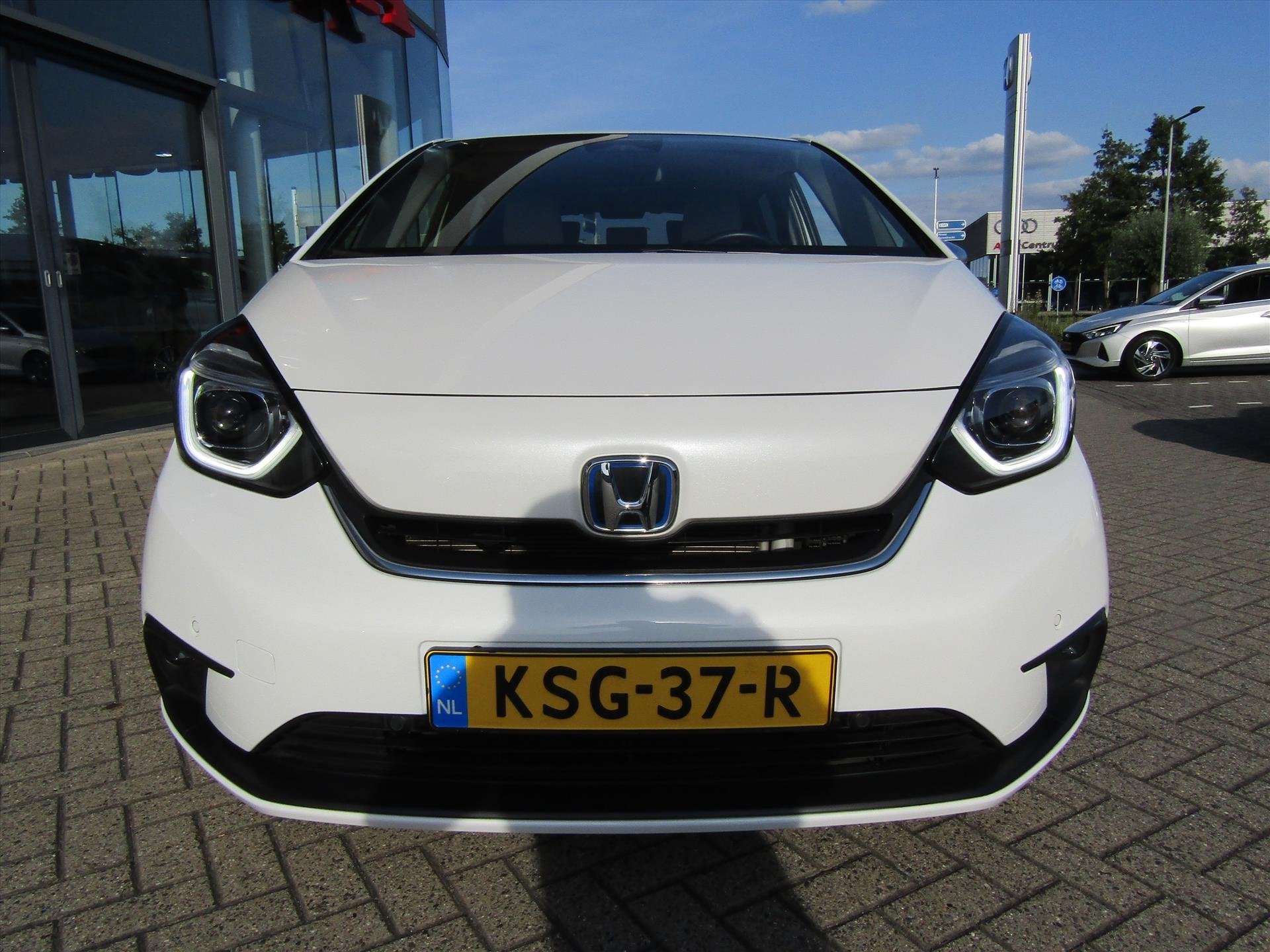 Honda Jazz 1.5 i-MMD 109pk Hybrid CVT Executive, ALLWEATHERB, Auto's, Honda, Dealer onderhouden, Leder en Stof, Wit, 98 pk