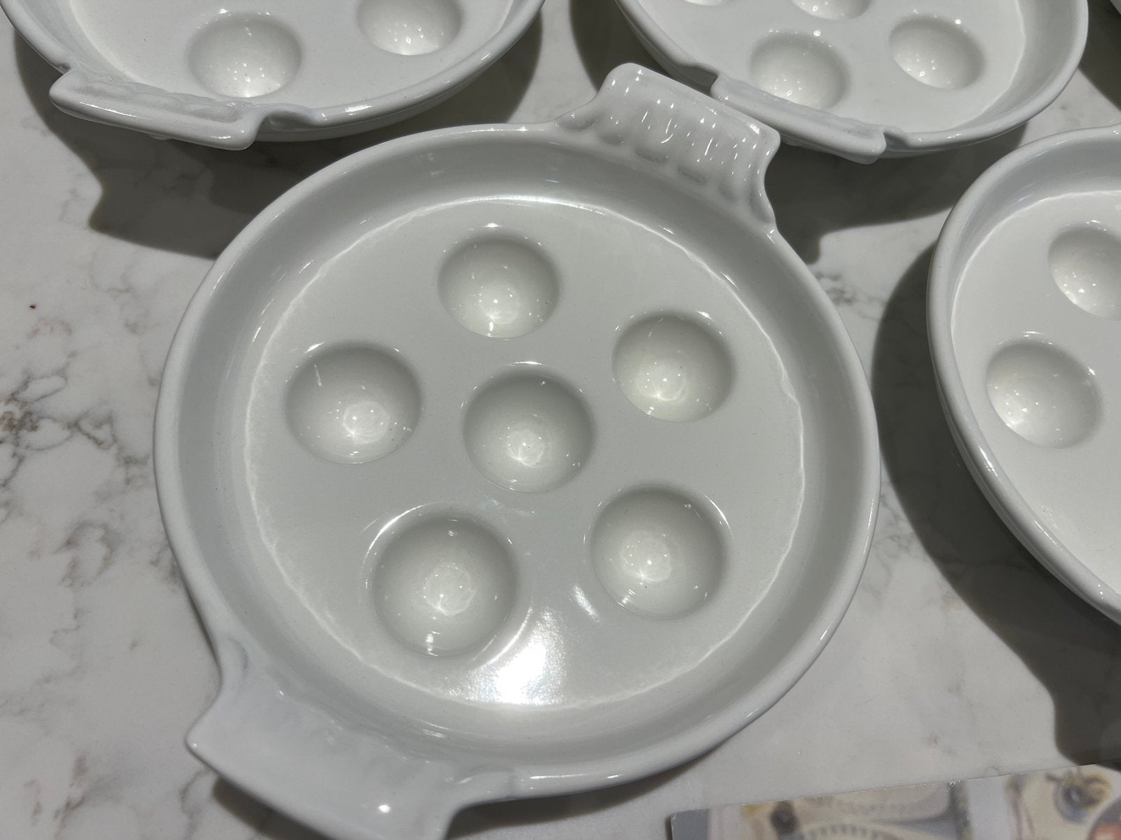 Set van 8 escargot bordjes van gietijzer, als nieuw, Huis en Inrichting, Overige typen, -, -, Ophalen of Verzenden