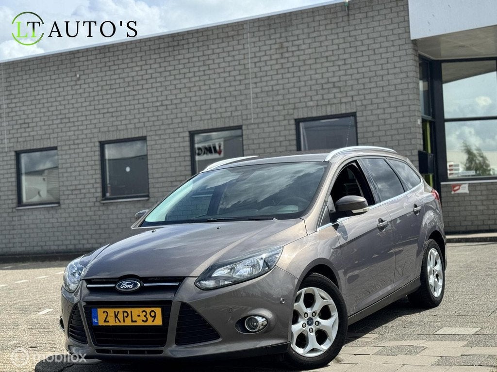 Ford Focus Wagon 1.6 TDCI ECOnetic Lease Titanium|Leer Navi, Auto's, Euro 5, 4 cilinders, Bruin, 1560 cc