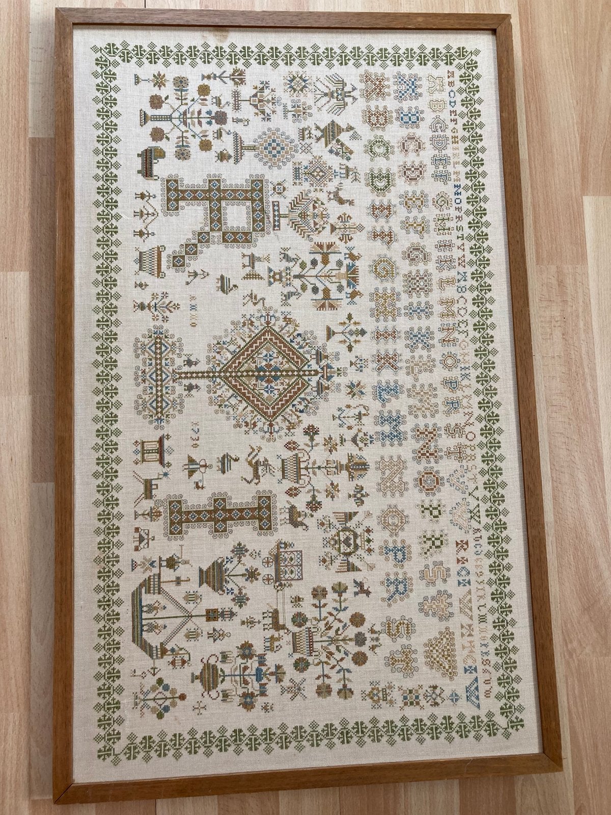 Verzameling oude merklappen, Ophalen