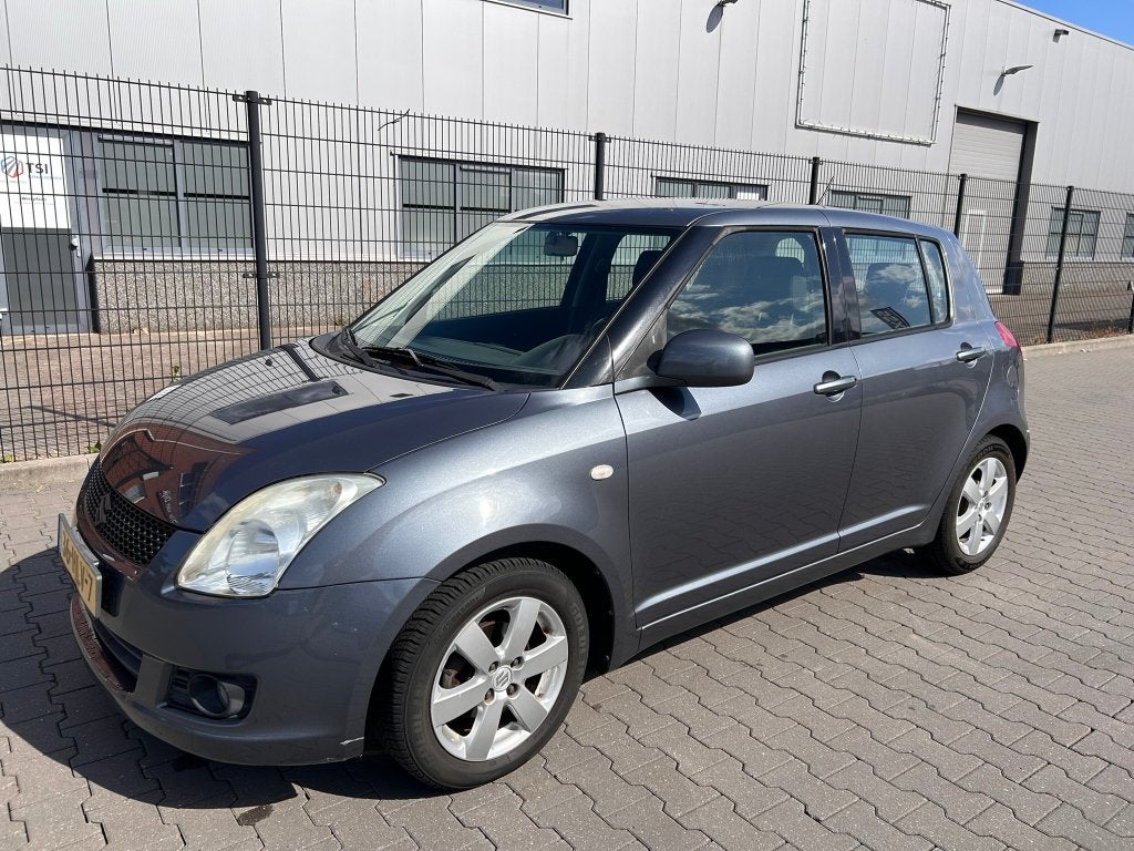Suzuki Swift 1.3 5DRS 2009 Grijs, Voorwielaandrijving, Stof, 400 kg, Swift