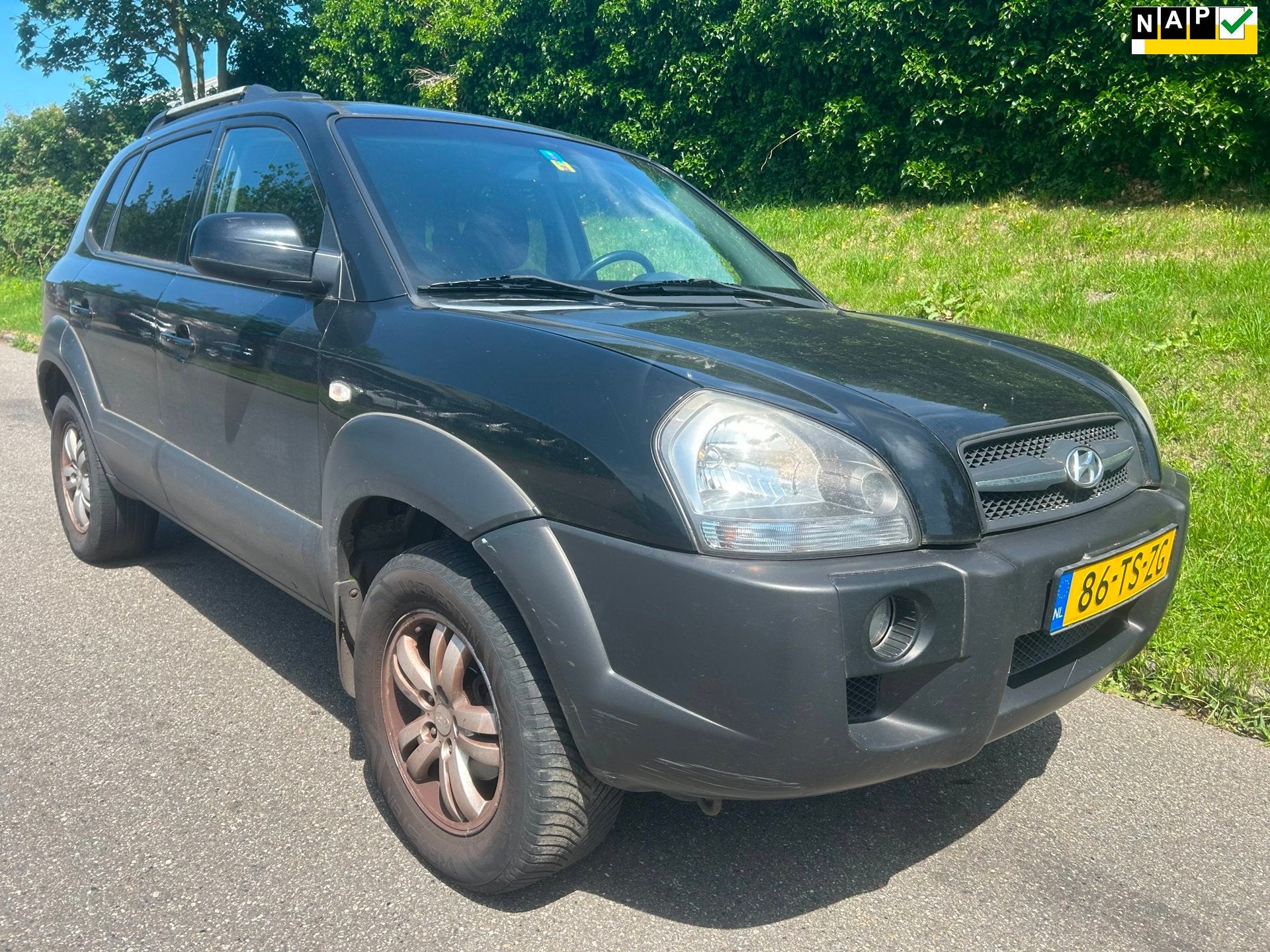 Hyundai Tucson 2.0i Style - Climate control - cruise control, Auto's, Verwarmde buitenspiegels, Gebruikt, 4 cilinders, Zwart