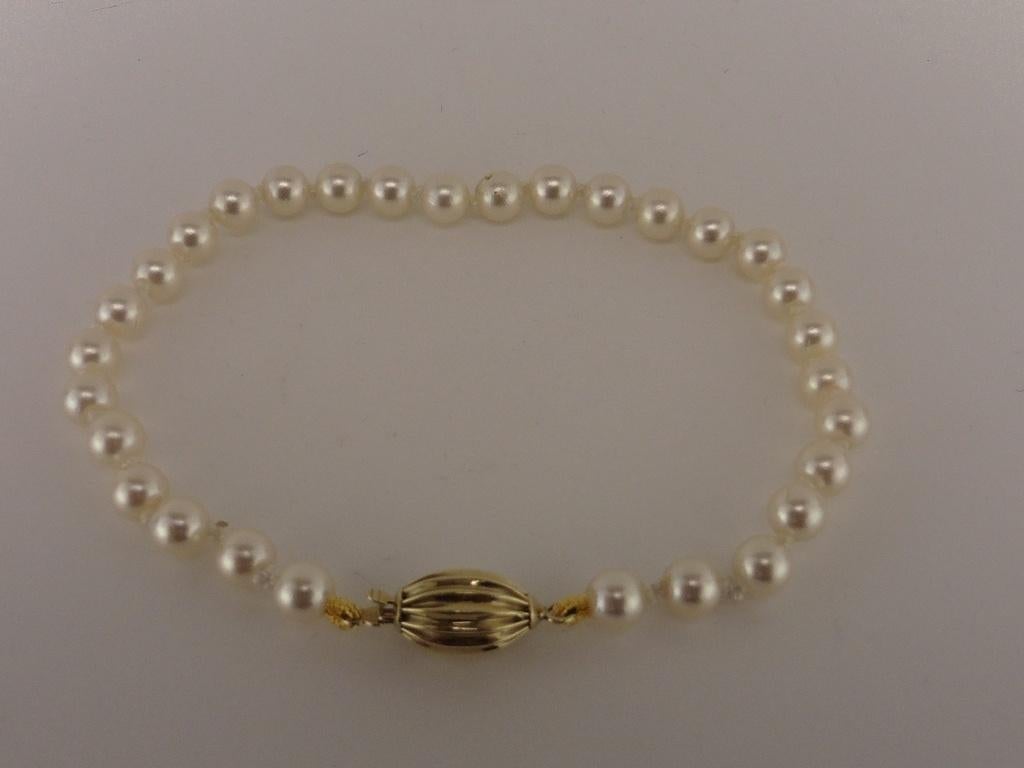 Parel armband met gouden slot                            D53, Overige materialen, Gebruikt, Overige kleuren, .