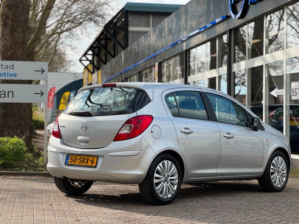 Opel Corsa 1.2-16V Cosmo NAVI Cruise Airco 5drs Luxe uitvoer, Voorwielaandrijving, Euro 5, Gebruikt, 4 cilinders