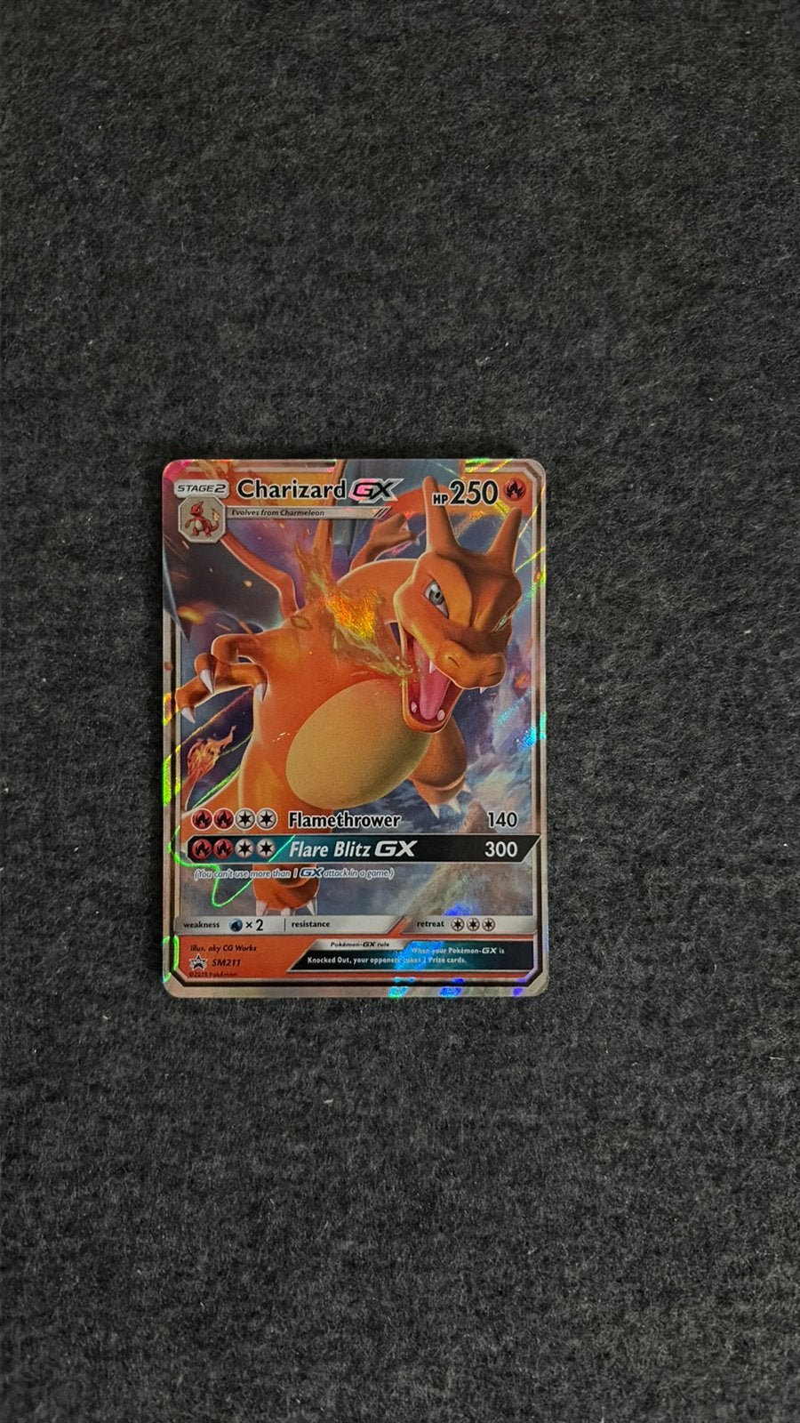 Charizard GX Promo SM211, Ophalen of Verzenden, Zo goed als nieuw