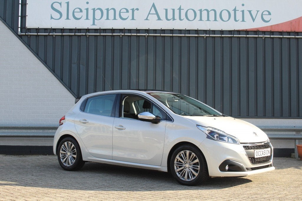 Peugeot 208 1.2 PURETECH ALLURE/ AUTOMAAT- NAVI-PANO-D.riem, Auto's, Gebruikt, Euro 6, 1199 cc, Verwarmde buitenspiegels
