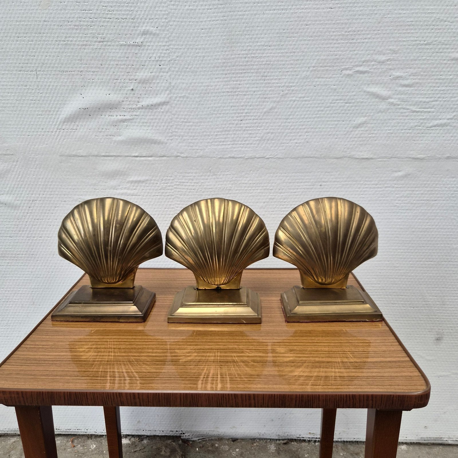 Set van 3 messing boekensteunen in (art deco) schelpvorm, Ophalen of Verzenden