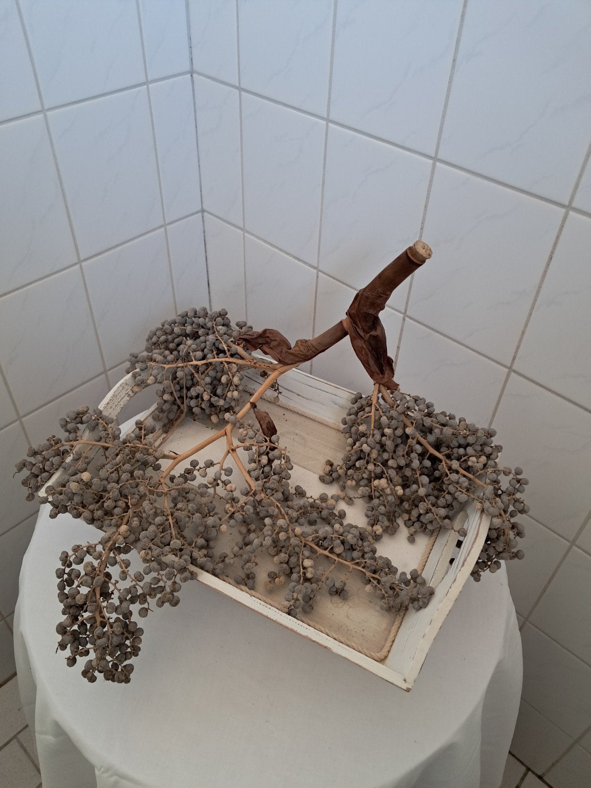 Houten dienblad met dadeltak, Ophalen