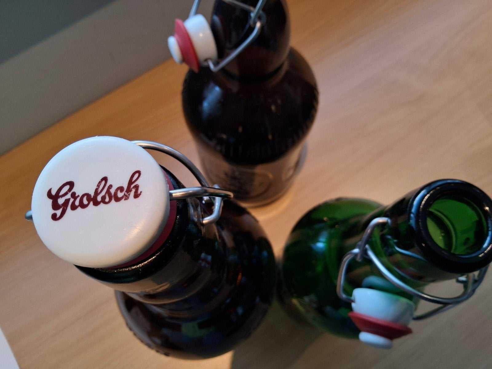 3 Grolsch beugelflessen - bruin en groen glas, 1/ 1,5 liter., Ophalen, Grolsch