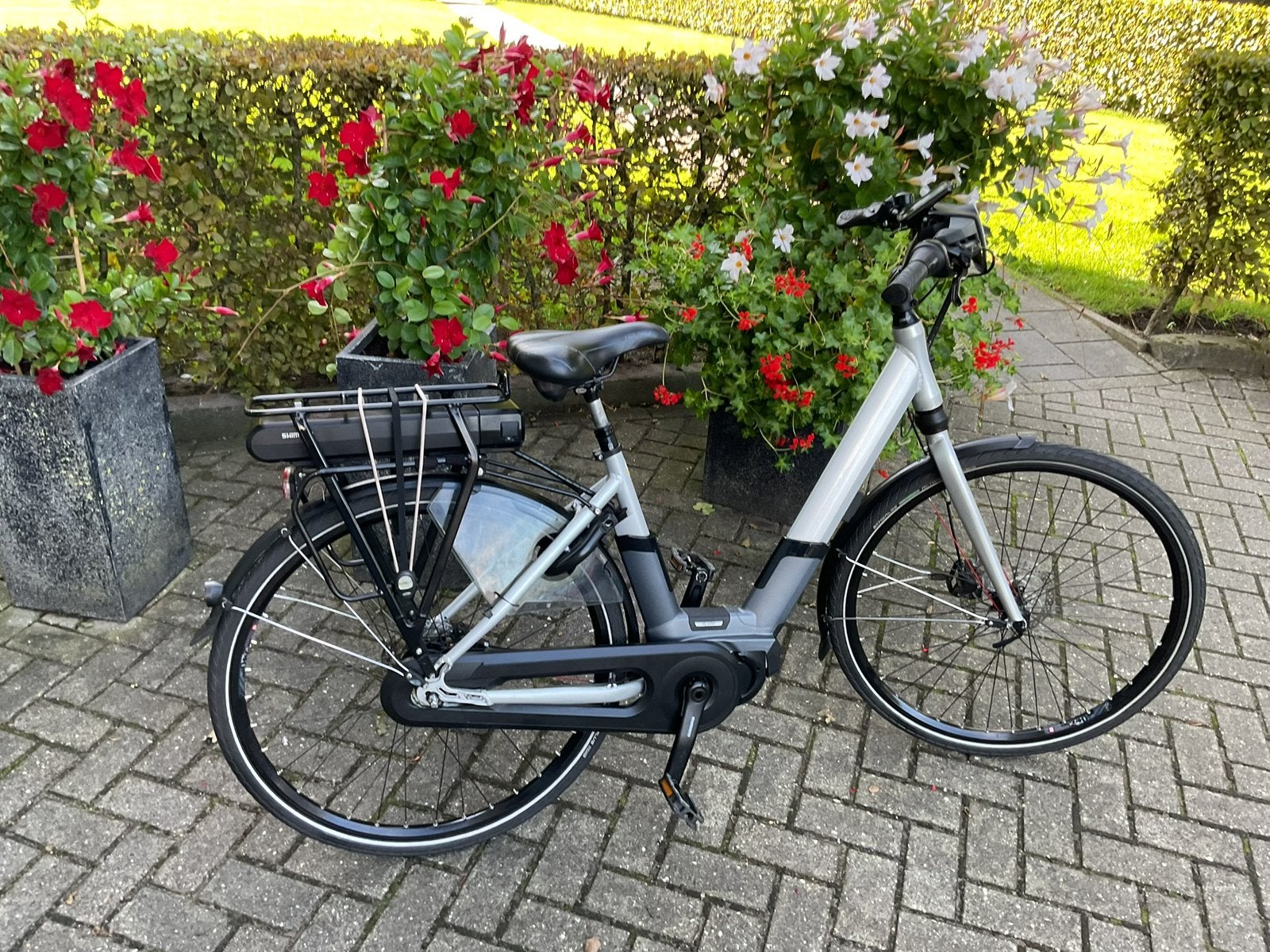 Moderne SYM Ebike met extra zware accu en GPS tracker, Verzenden, Gebruikt, 50 km per accu of meer, Overige merken