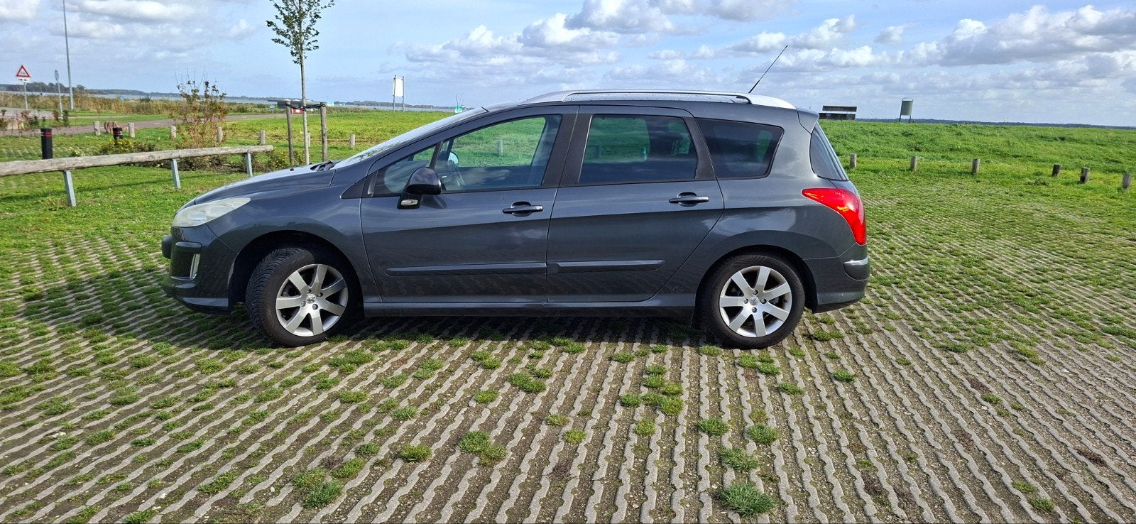 Peugeot 308 1.6 VTI 16V SW 7P 2010 Grijs, Voorwielaandrijving, 4 cilinders, 7 stoelen, Origineel Nederlands