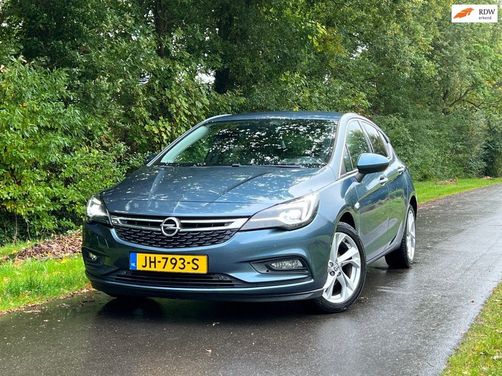 Opel Astra 1.4 Innovation | Keyless + Leder + Camera Nu €, Auto's, Parkeersensor, Gebruikt, 150 pk, Blauw