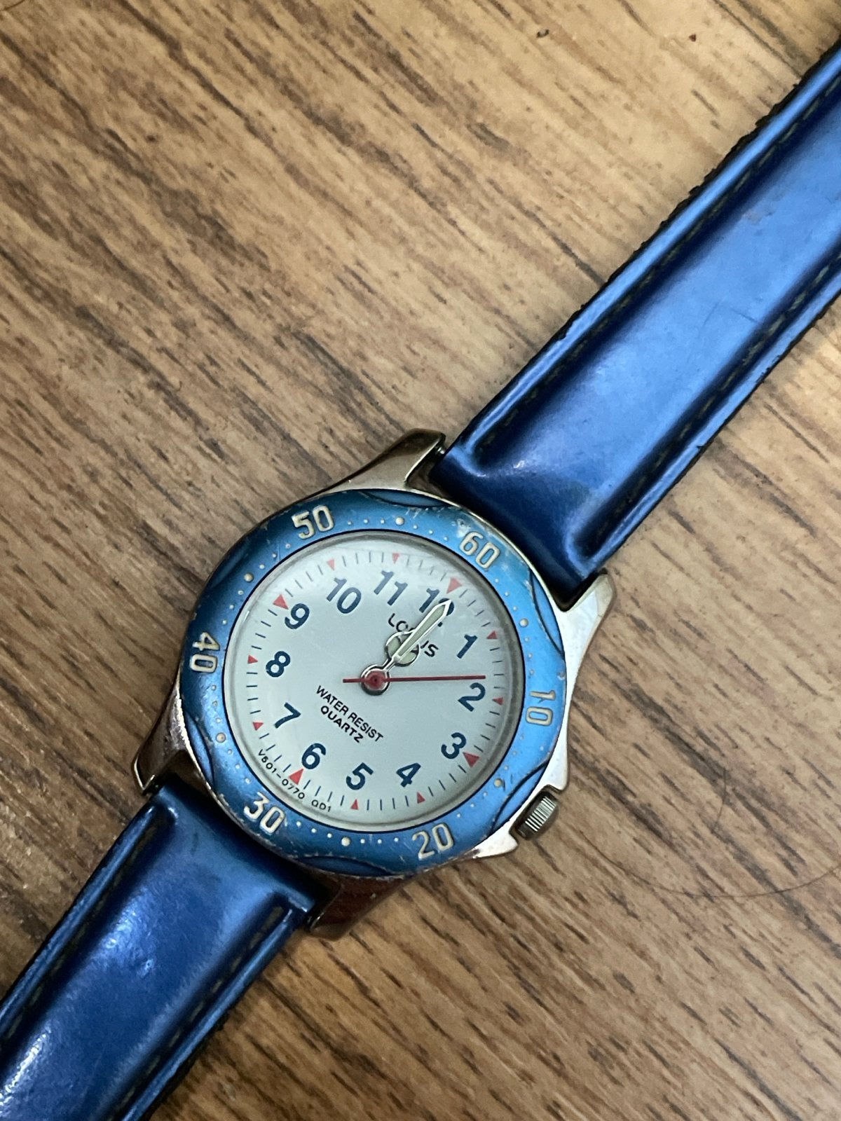 Lotus horloge - batterij moet vervangen worden, Sieraden, Tassen en Uiterlijk, Ophalen of Verzenden, Gebruikt, Blauw, Jongen of Meisje