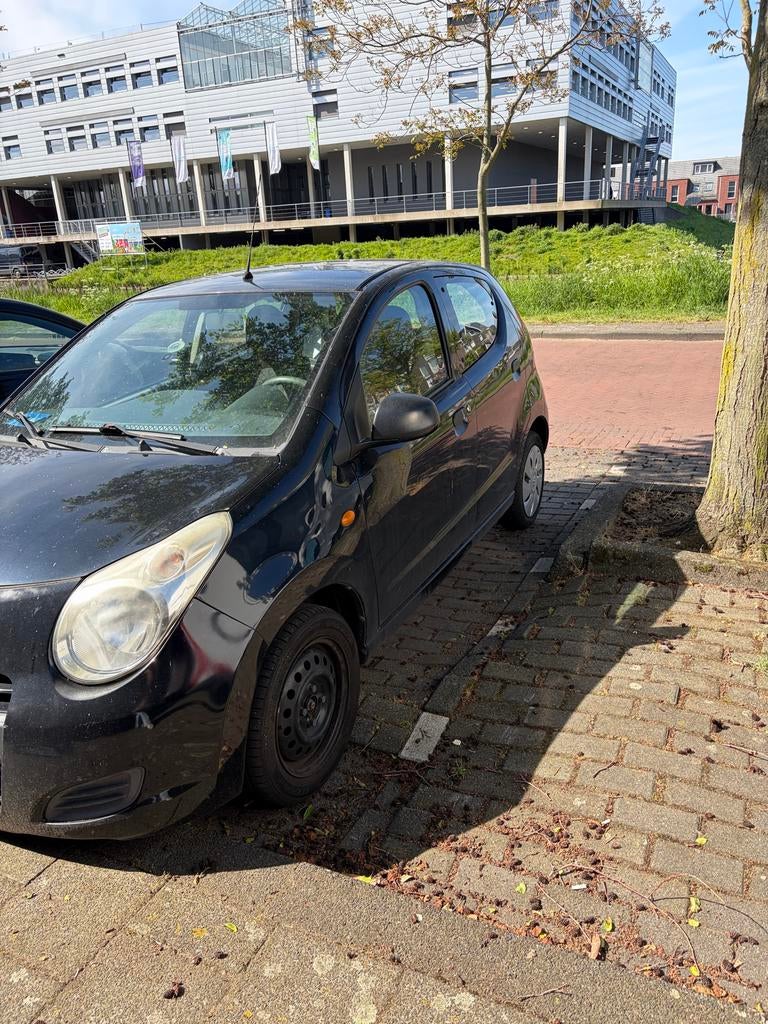 Suzuki Alto 1.0 2010 Zwart, Voorwielaandrijving, 200 kg, 4 stoelen, Origineel Nederlands