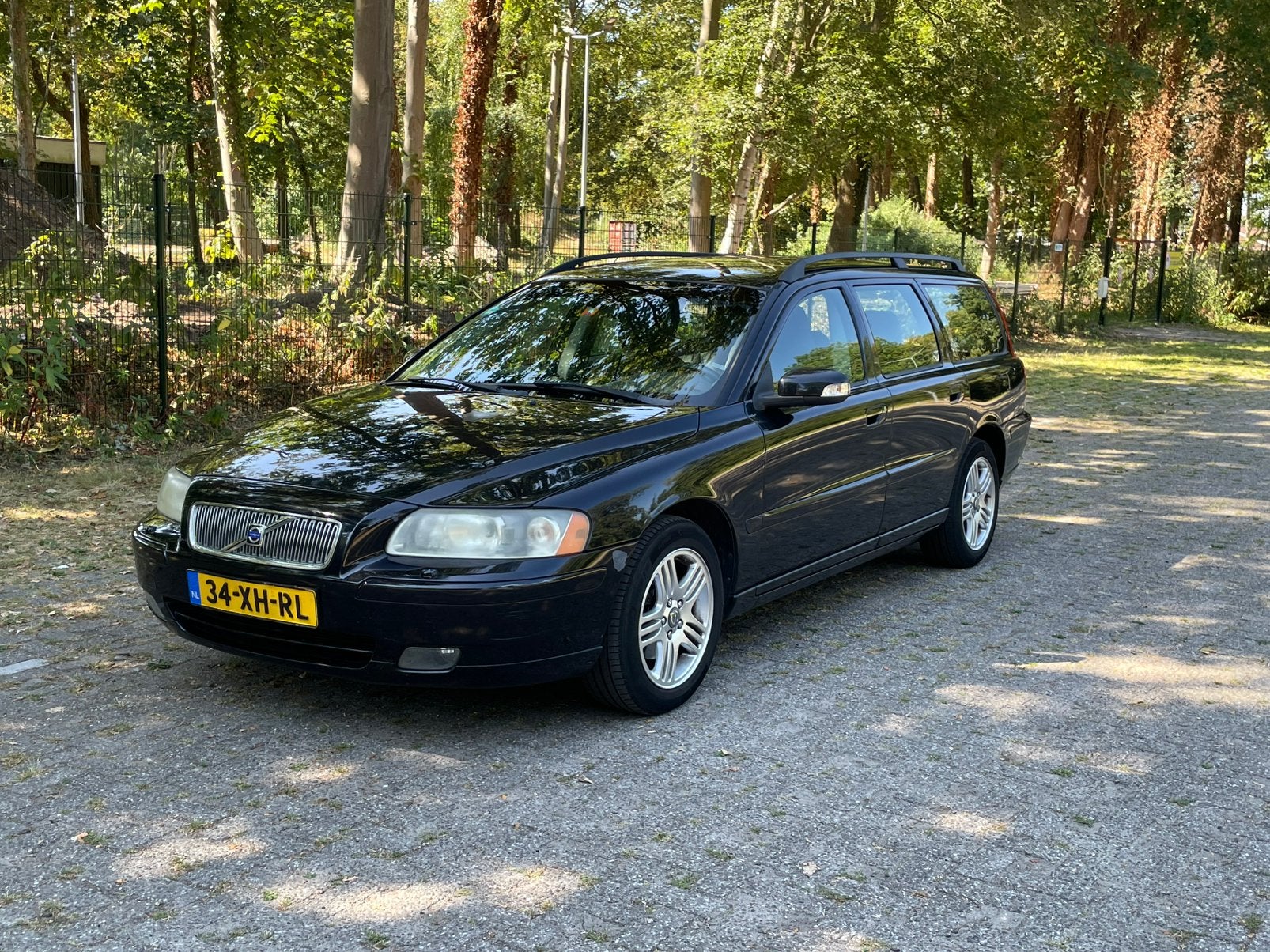 Volvo V70 2.4 140PK 2007 Zwart, Auto's, Volvo, Voorwielaandrijving, Navigatiesysteem, 1800 kg, Zwart