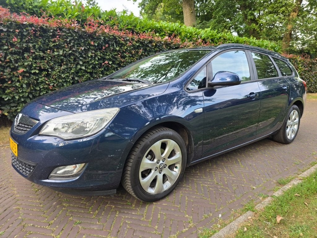 Opel Astra Sports Tourer 1.4 Turbo Bns + (bj 2012), Auto's, Opel, Voorwielaandrijving, Euro 5, Stof, Gebruikt