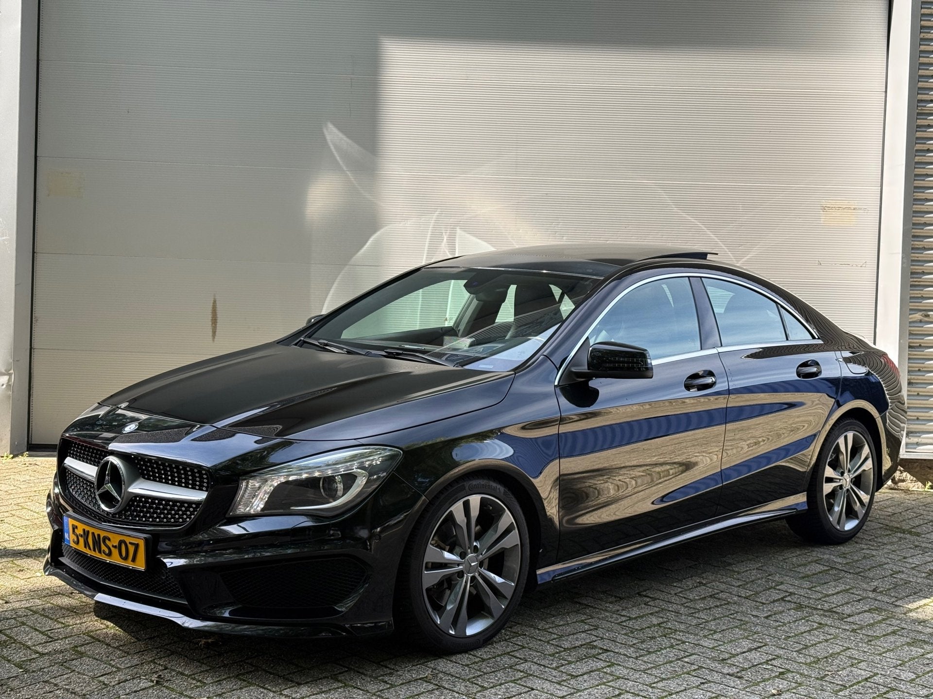 Mercedes-Benz CLA-klasse 250 Sport Ambition AMG l Pano l Mem, 1380 kg, Gebruikt, 4 cilinders, Zwart