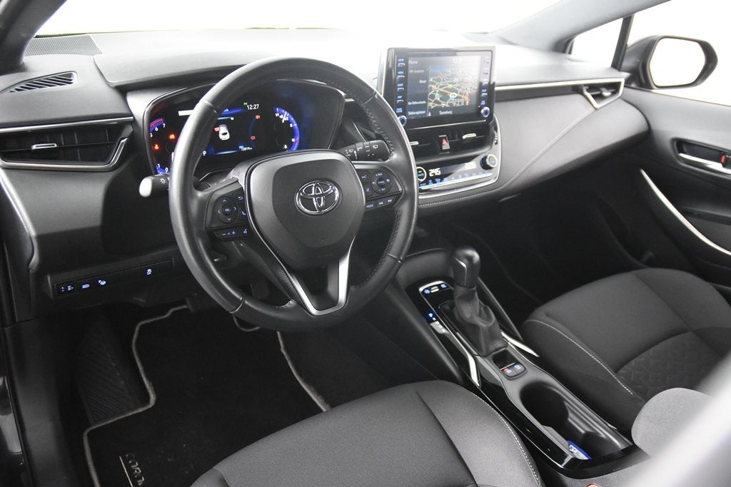 Toyota Corolla 1.8 Hybrid *1.ste Eigenaar*Navigatie*PDC*, Auto's, Toyota, Stof, Gebruikt, 4 cilinders, Corolla