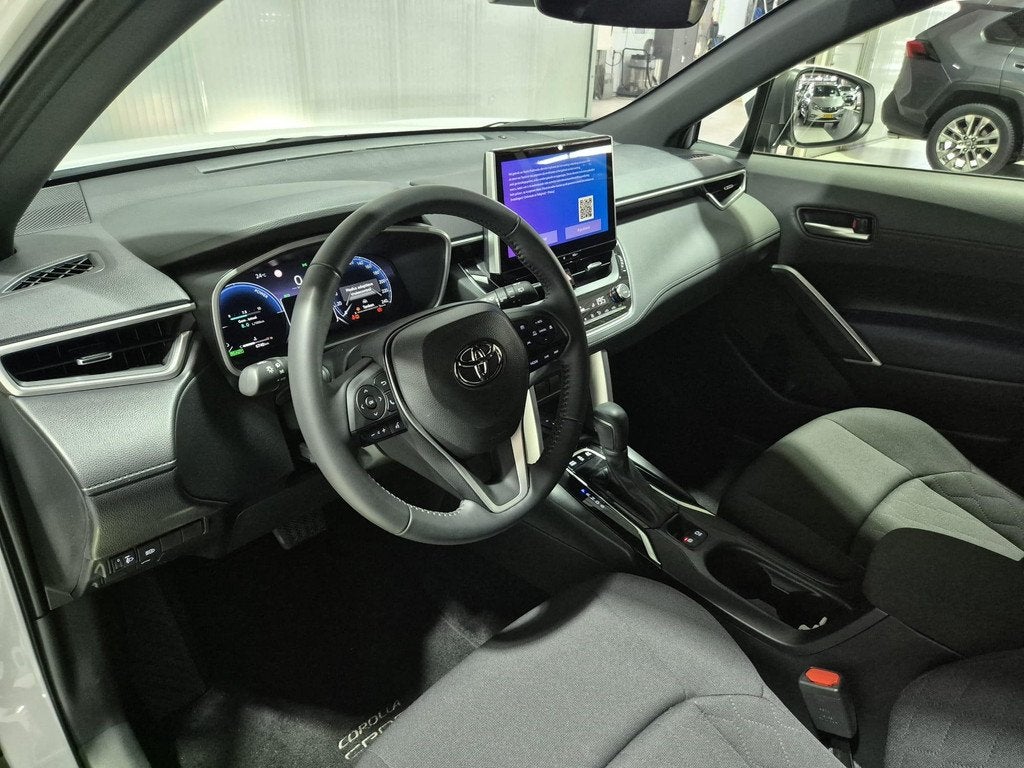 Toyota Corolla Cross Hybrid 200 Dynamic Adaptieve cruise con, Auto's, Automatische klimaatregeling, Gebruikt, 4 cilinders, Bedrijf