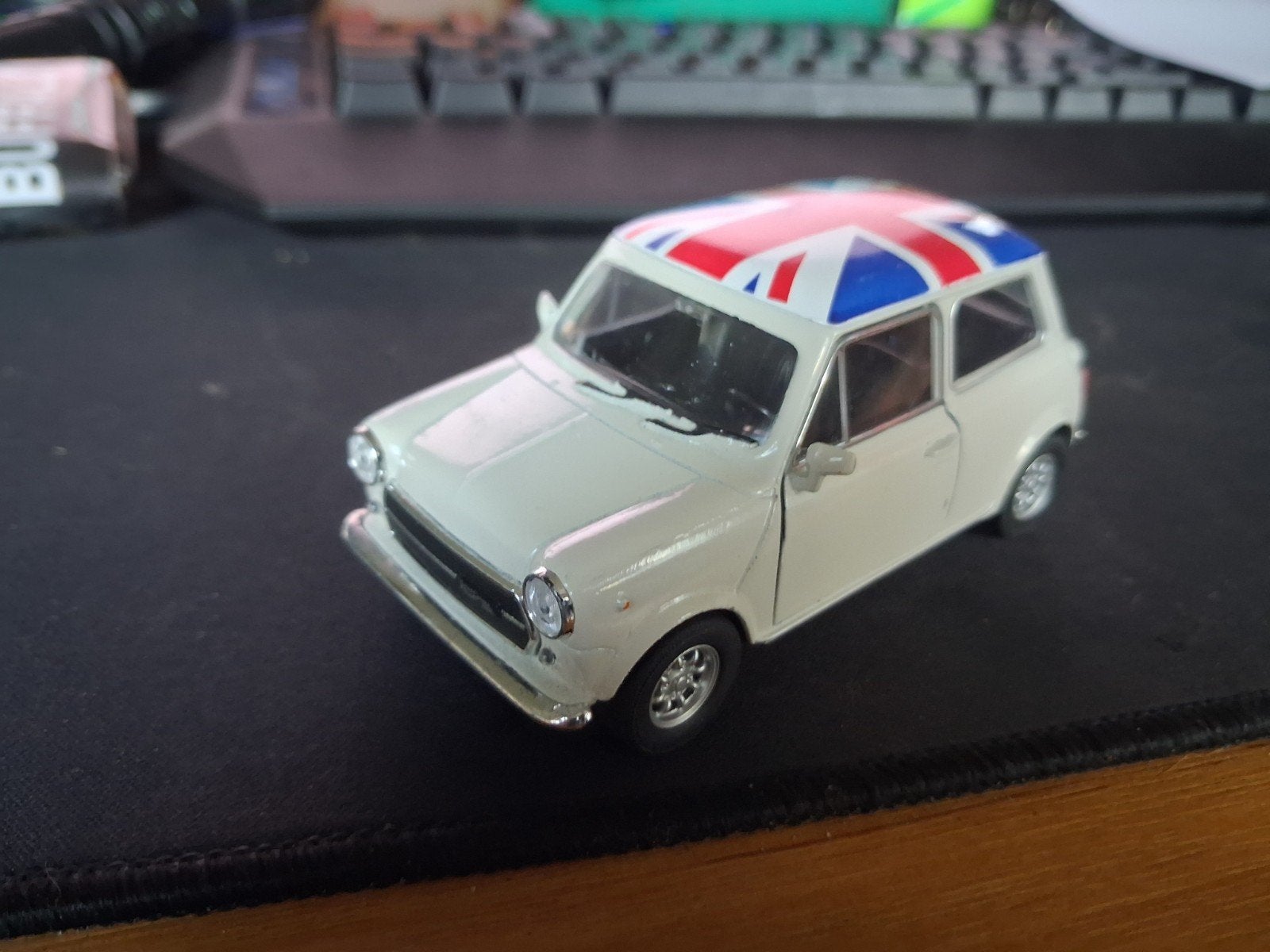 Welly Mini Cooper met Union Jack dak - Modelauto, Ophalen of Verzenden, Gebruikt, Auto, Overige merken