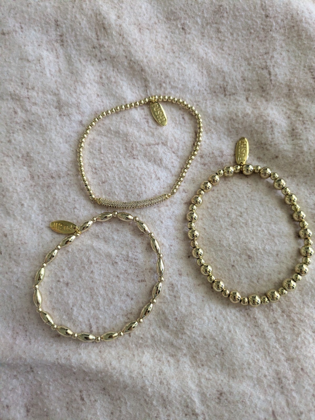 Fushi armband zo goed als nieuw, Overige materialen, Ophalen of Verzenden, Zo goed als nieuw, Goud