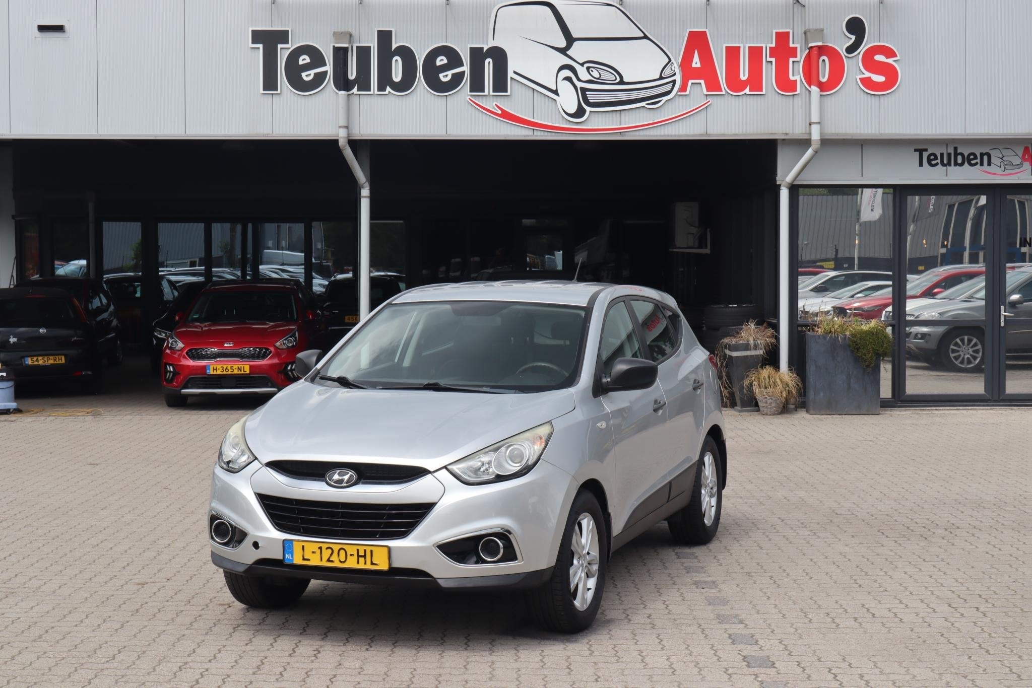 Hyundai ix35 2.0i Business Edition Airco, Gebruikt, Automatische klimaatregeling, 4 cilinders, Leder en Stof
