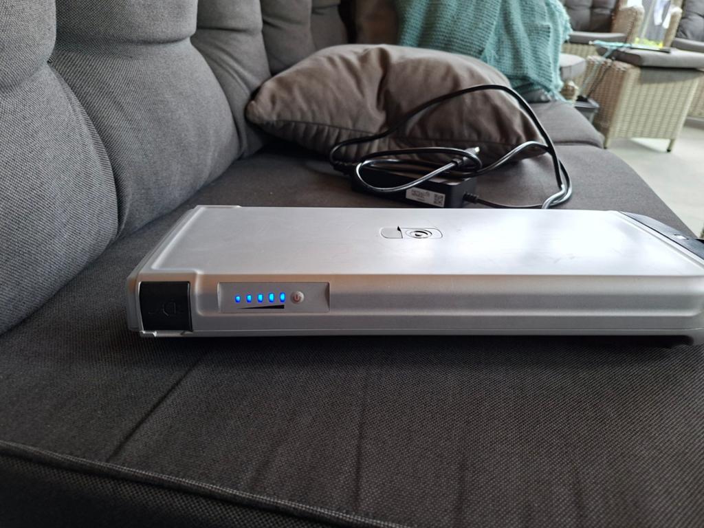 Fiets accu plus lader, Ophalen