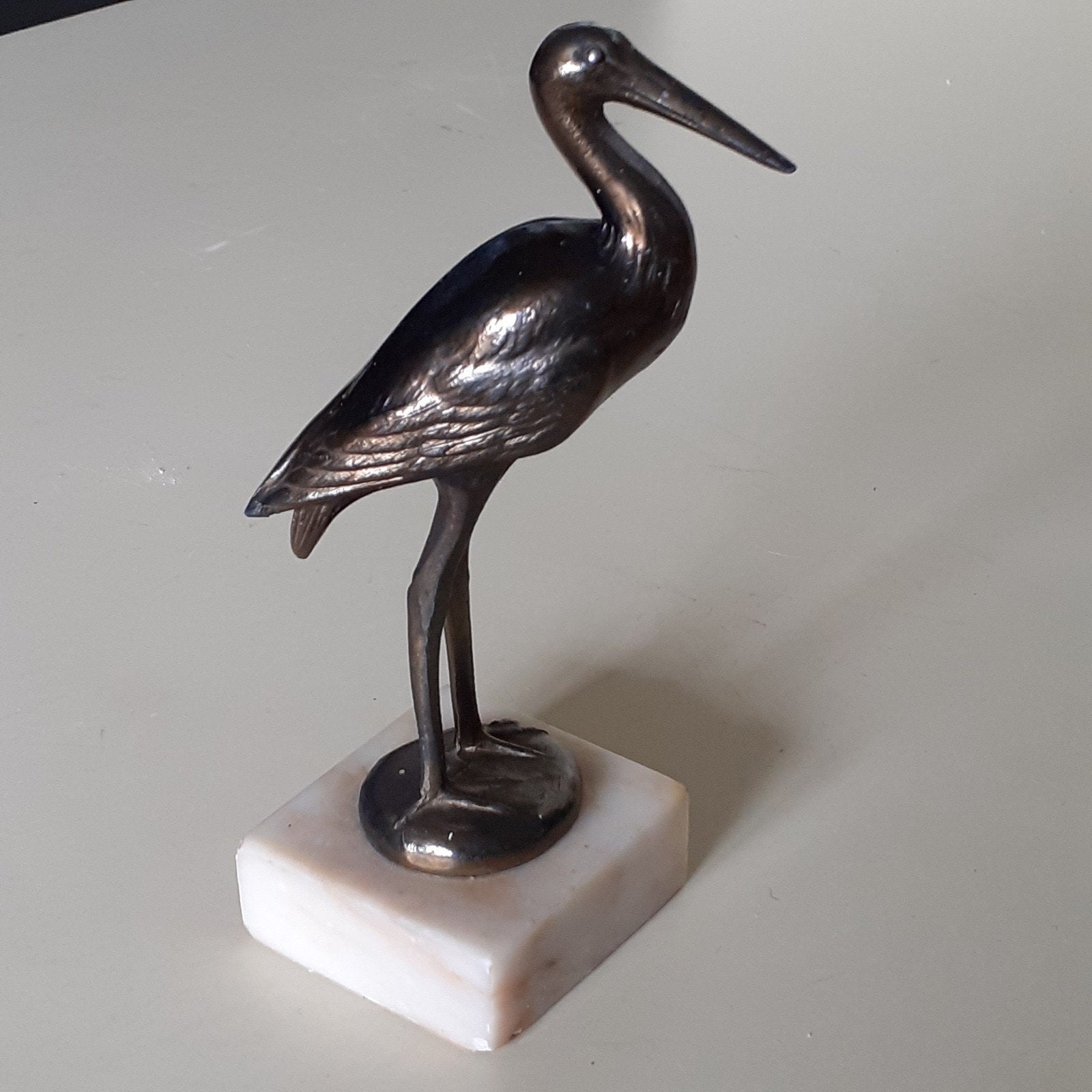 Art Deco Ooievaar op marmer voet, Antiek en Kunst, Ophalen of Verzenden