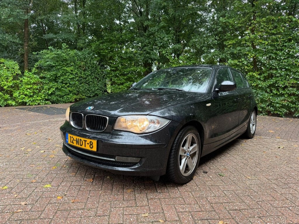 BMW 1-Serie 2.0 116I 5DR 2010 Zwart - Youngtimer!, Auto's, 1-Serie, 1995 cc, Zwart, 4 cilinders