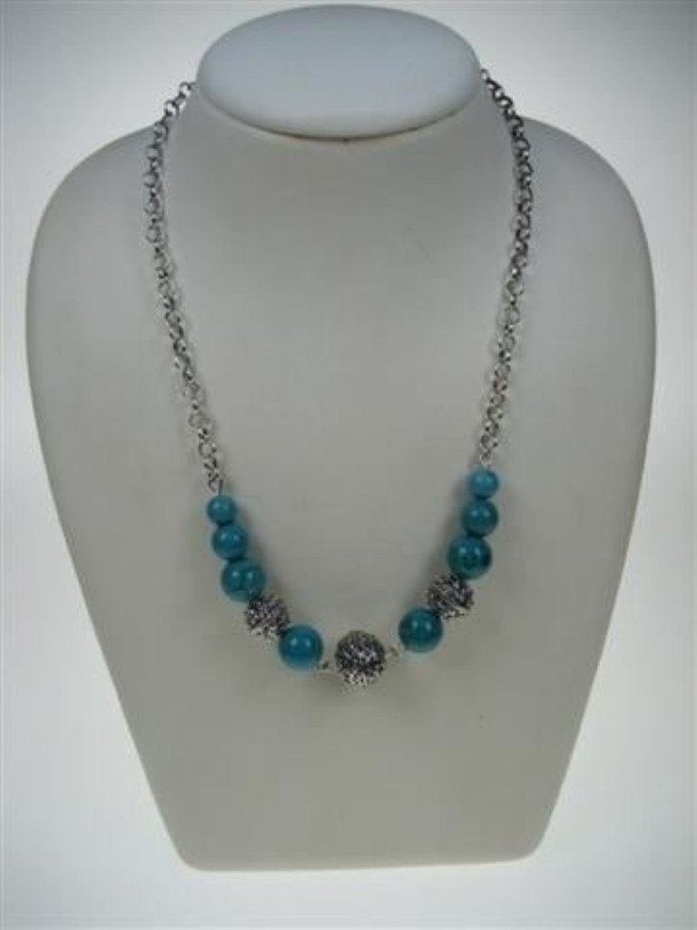 Turkoois collier met oude zilverstukken uit ons atelier zelf