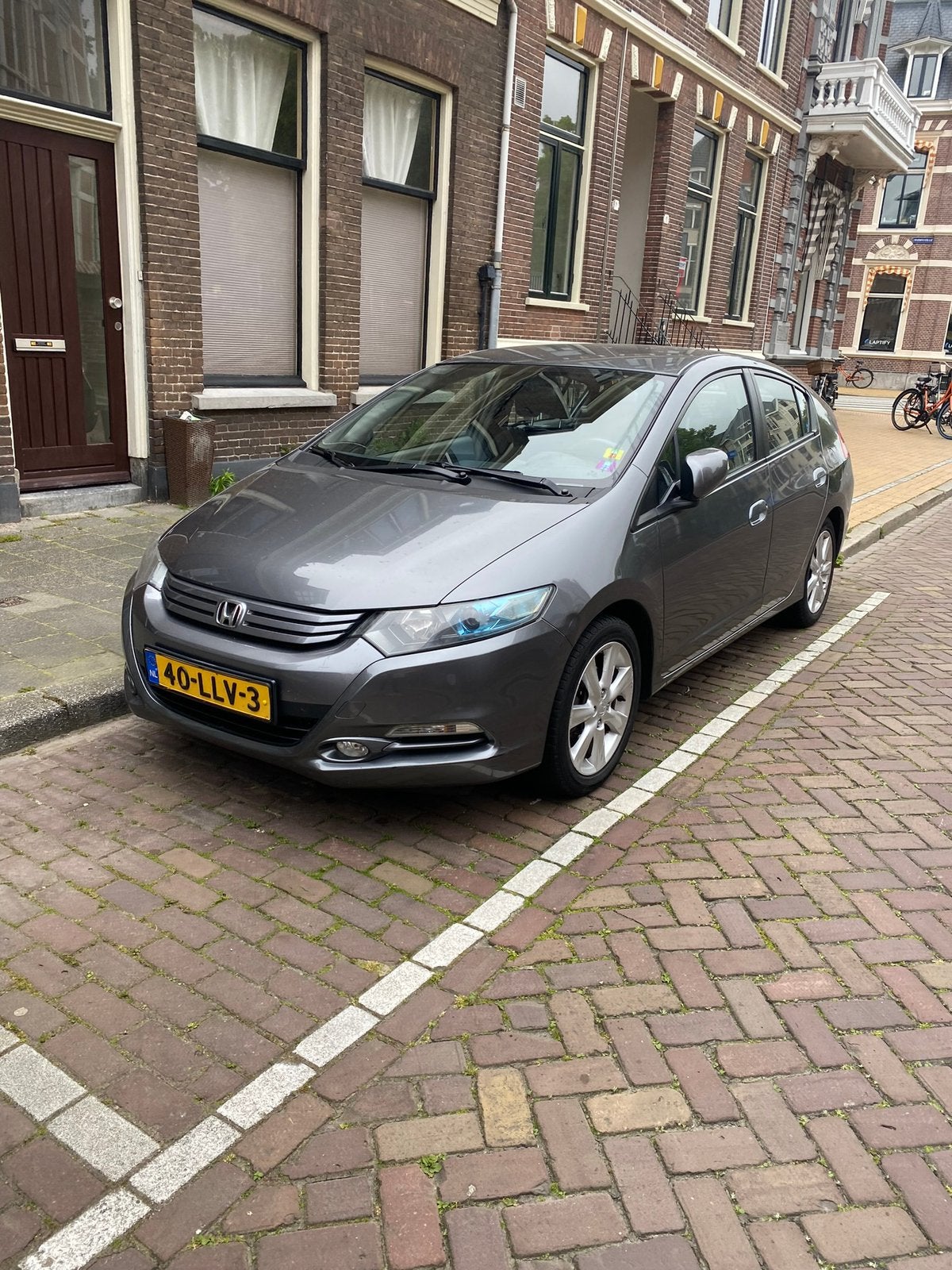 Honda Insight 1.3 Hybrid AUT 2010 Grijs Elegance Full Option, 4 cilinders, 1176 kg, 22 km/l, Te koop