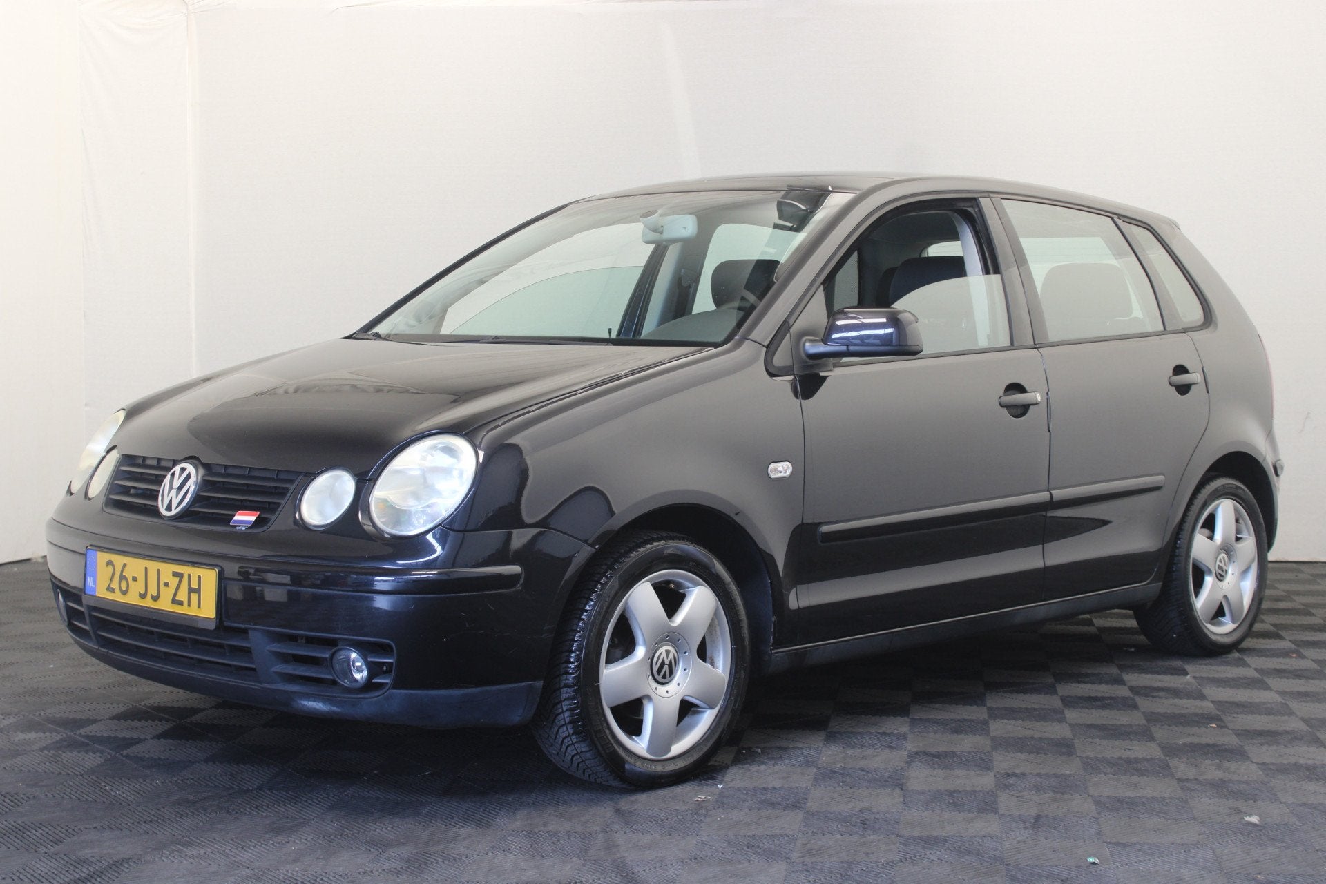 Volkswagen Polo 1.4-16V Highline (bj 2002), Voorwielaandrijving, Zwart, 4 cilinders, Zwart