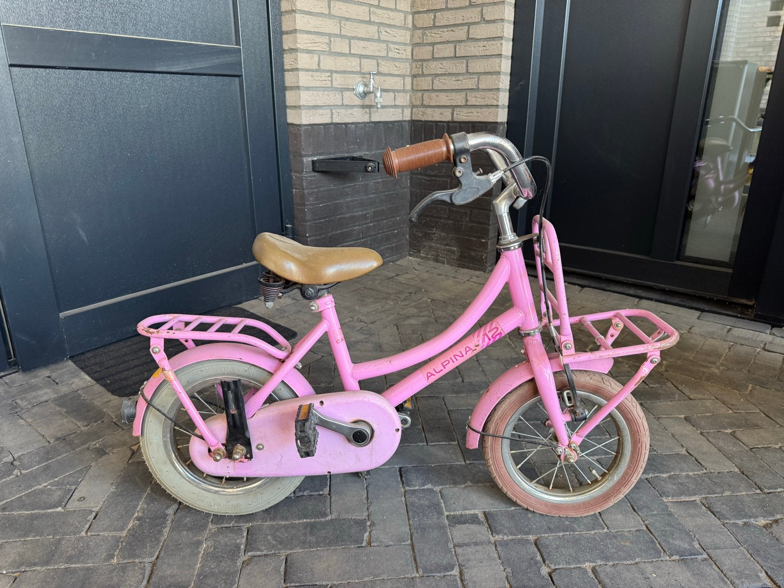 Roze 12 inch meisjesfiets met zijwieltjes (gebruikt), Ophalen of Verzenden, Gebruikt, Minder dan 16 inch, Zijwieltjes