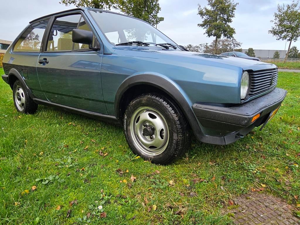 Volkswagen Polo 1.0 Coupe K6 1987 Blauw, Auto's, Voorwielaandrijving, 4 cilinders, Blauw, Origineel Nederlands