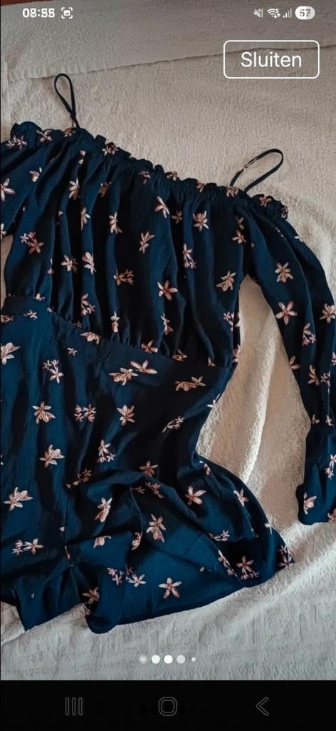 Nieuwe donkerblauwe playsuit met bloempjes, maat L, Blauw, Maat 42/44 (L), Nieuw, Ophalen of Verzenden