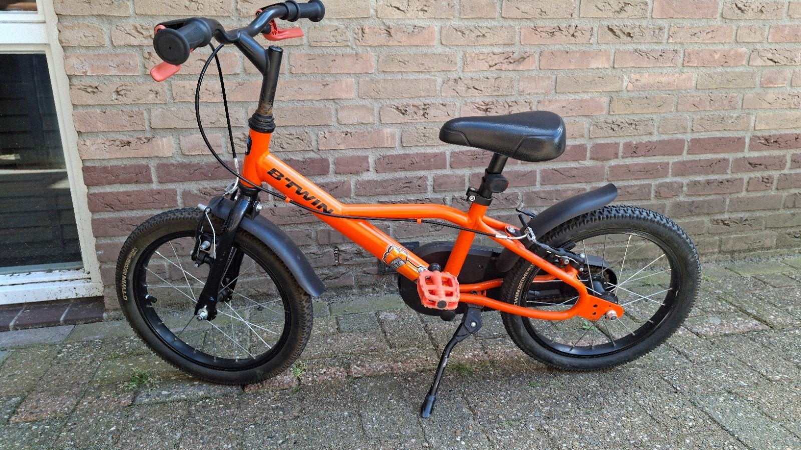 Gebruikte B'Twin kinderfiets 16 inch - Oranje, Ophalen, Terugtraprem, B'Twin, 16 tot 20 inch