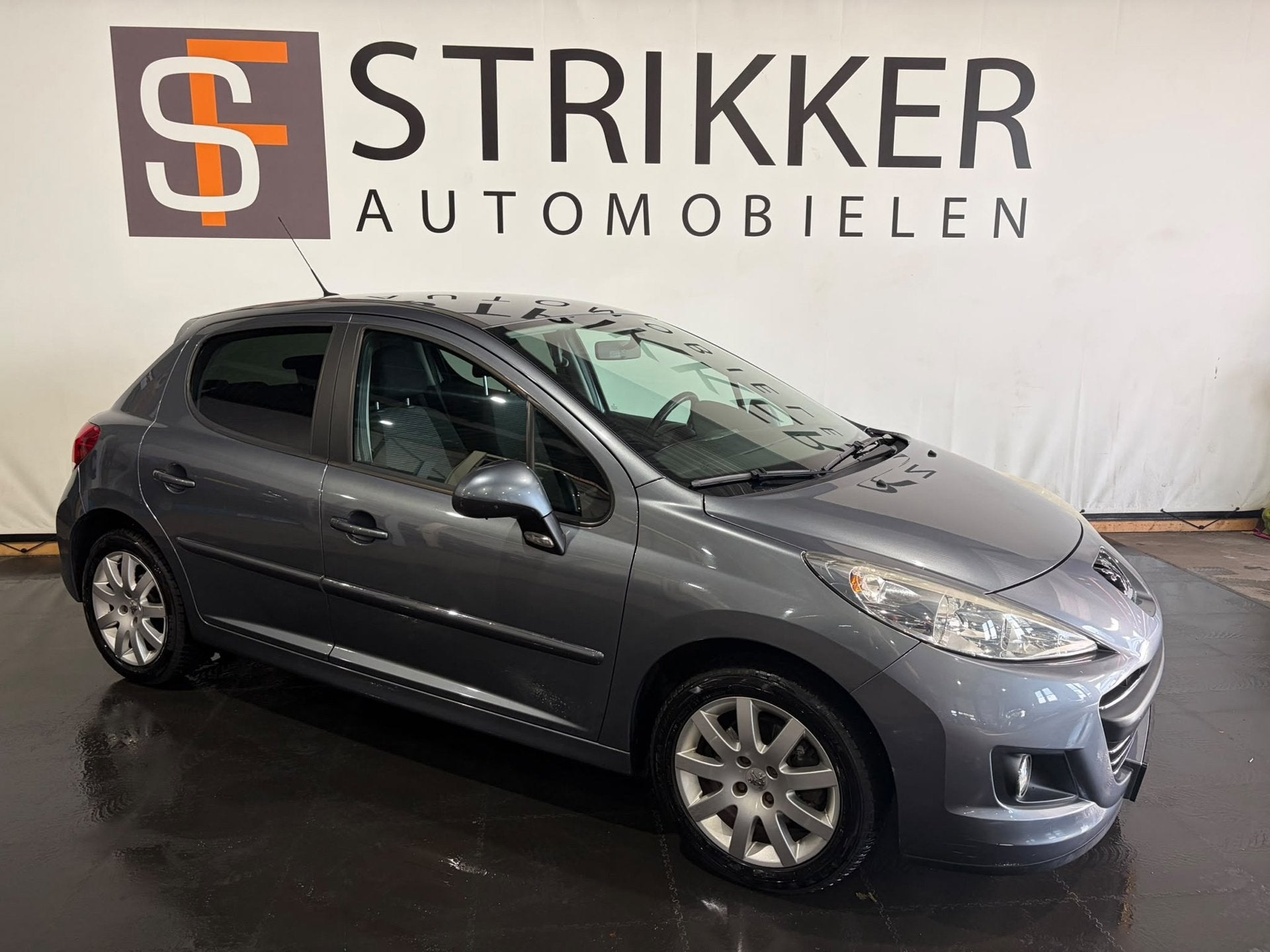 Peugeot 207 1.6 VTi Sportium, Auto's, Voorwielaandrijving, Euro 5, Stof, Gebruikt