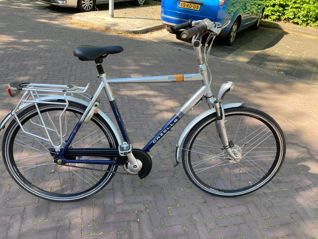 Gazelle Orange herenfiets, Fietsen en Brommers, Fietsen | Heren | Herenfietsen, Ophalen of Verzenden, Zo goed als nieuw, Gazelle