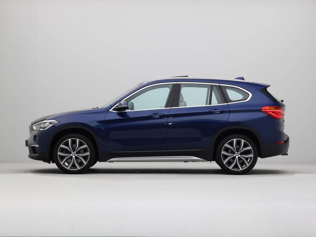 BMW X1 Sdrive20i 192pk Aut 2019 Blauw, Auto's, 1998 cc, Beige, 1850 kg, Blauw