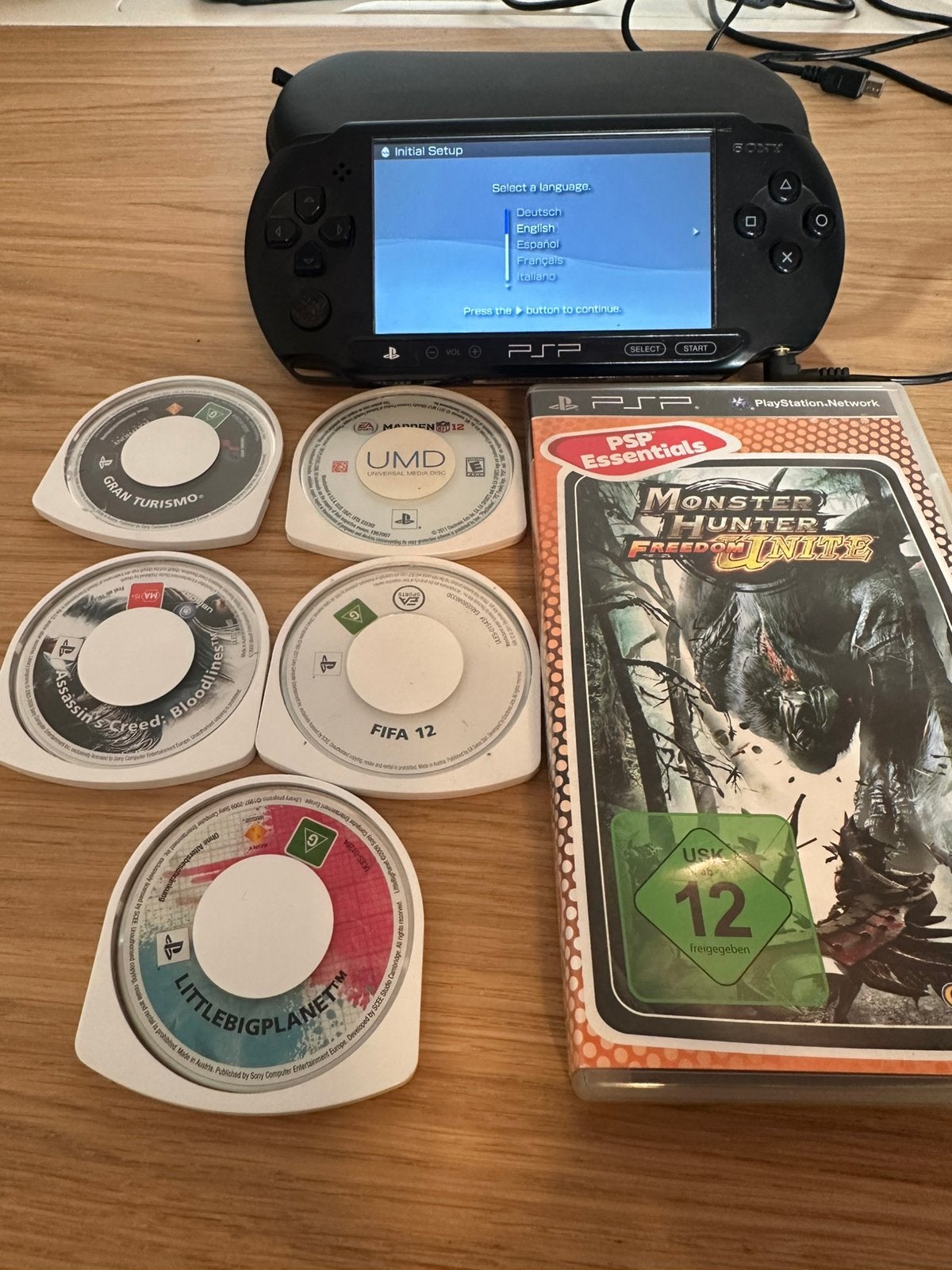 Psp e1004 met 6 spellen, Spelcomputers en Games, Met games, Zwart, Ophalen of Verzenden, Zo goed als nieuw