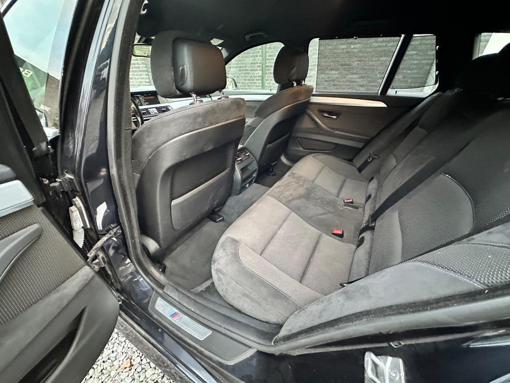 Foto 12 van BMW 5-serie Touring 520i High Executive netteauto/keurigonde