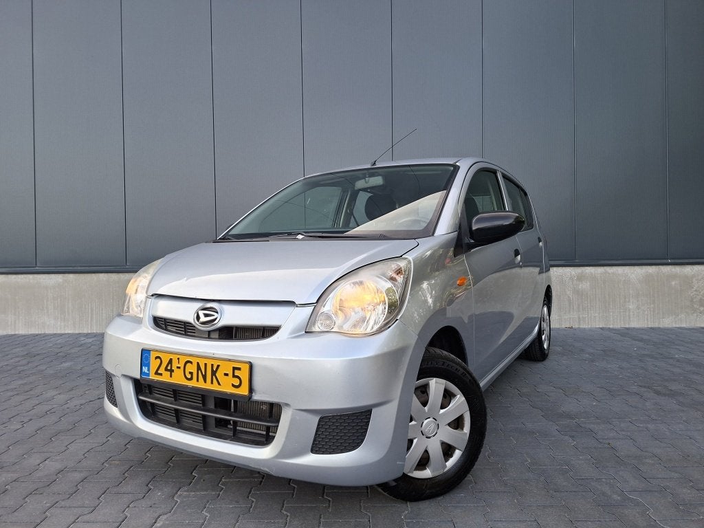 Daihatsu Cuore 1.0 Premium | NAP | 5 deurs | Stuurbekrachtig, Auto's, Dealer onderhouden, Stof, 18 €/maand, 4 stoelen