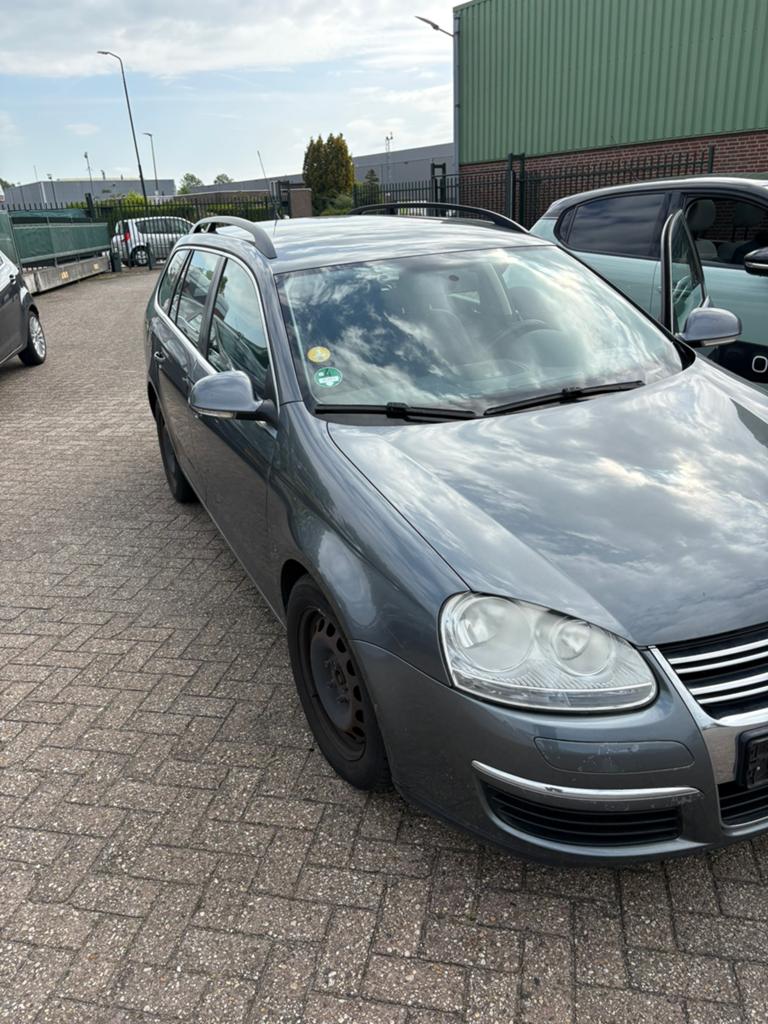 Volkswagen Golf 1.9 TDI 77KW Variant 2009 Grijs, Auto's, Voorwielaandrijving, 4 cilinders, Origineel Nederlands, Stationwagon