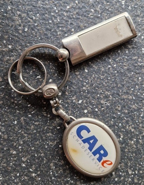 Sleutelhanger van Care schadeservice, Ophalen of Verzenden, Gebruikt