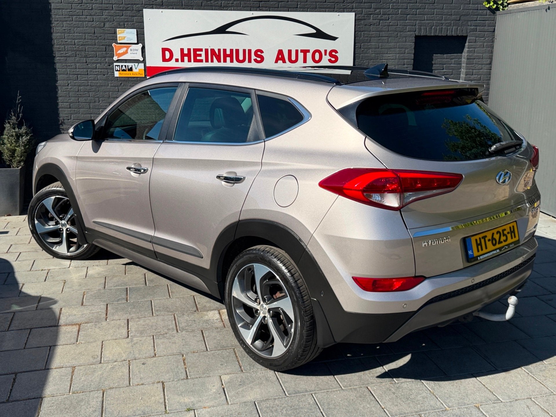Hyundai Tucson 1.6 T-GDi Premium 4WD AUTOMAAT|PANODAK|LEDER, Auto's, Dealer onderhouden, Gebruikt, 4 cilinders, Met garantie (alle)